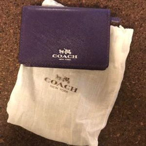 Small purple Coach wallet